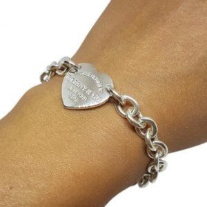 Authentic Tiffany and co heart charm bracelet.